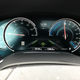 The dash of the 740e xDrive, when the driver assistance features are engaged.